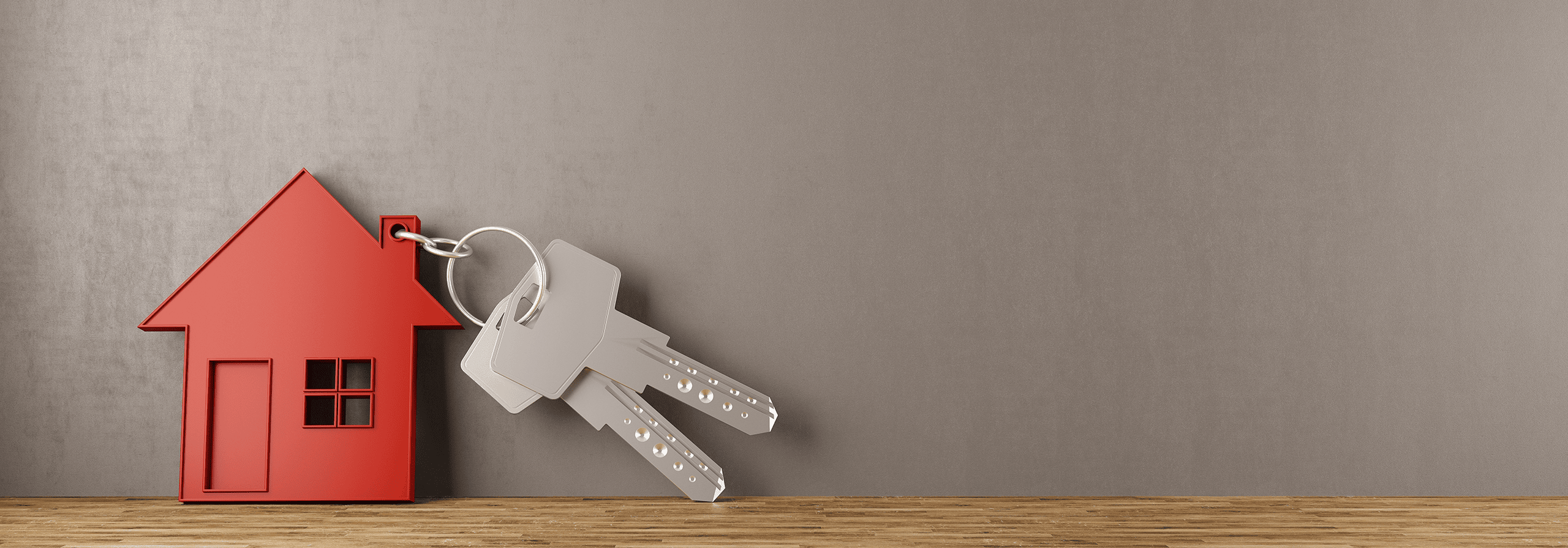 house keychain with 2 keys on it
